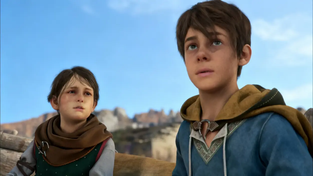 Due bambini in un paesaggio naturale, guardano in lontananza con espressioni serie.